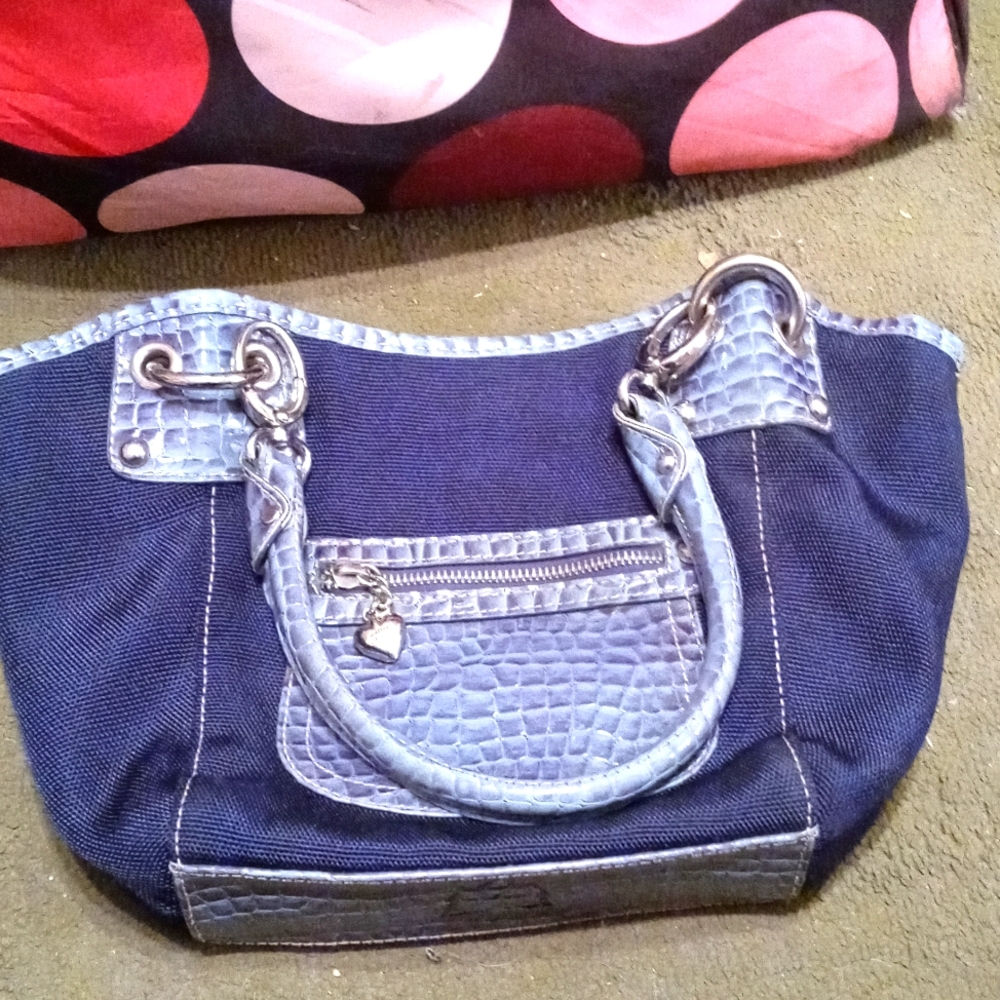 Navy blue purse with snake print